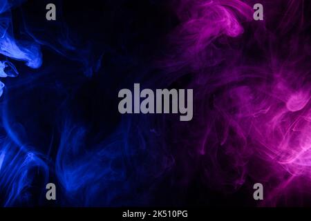 Flowing clouds of blue and purple neon smoke dark abstract background Stock Photo