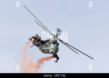 Mil Mi-24 Hind Combat Helicopter from the 221 Squadron Czech Air Force puts on a superb display at the Royal International Air Tattoo in England Stock Photo