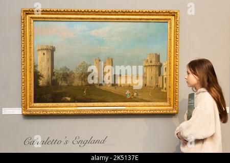 Worcester, UK. 5th Oct, 2022. 13-year-old Isabella Massochi admires a painting by Canaletto of Warwick Castle in Worcester City Art Gallery and Museum. The painting is on show with 22 other works in Canaletto: A Venetian's View, on now until 7th January 2022 at the gallery. The paintings are on loan from the Woburn Abbey Collection, Birmingham Museums, Tate and Compton Verney. Credit: Peter Lopeman/Alamy Live News Stock Photo