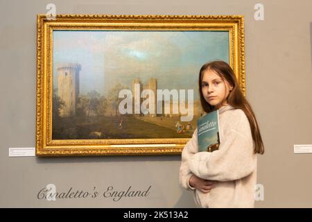 Worcester, UK. 5th Oct, 2022. 13-year-old Isabella Massochi admires a painting by Canaletto of Warwick Castle in Worcester City Art Gallery and Museum. The painting is on show with 22 other works in Canaletto: A Venetian's View, on now until 7th January 2022 at the gallery. The paintings are on loan from the Woburn Abbey Collection, Birmingham Museums, Tate and Compton Verney. Credit: Peter Lopeman/Alamy Live News Stock Photo