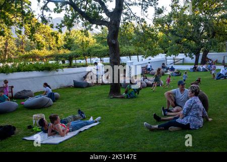 Visitors Relaxing at Boschendal Night Market  in Western Cape, South Africa Stock Photo