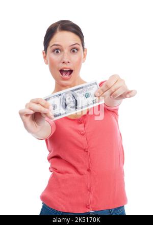 My first hard earned cash. Young woman holding a bill while looking at you in surprise. Stock Photo