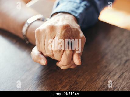 Marriage senior couple holding hands in for support, mental health and care after bad news, results or sick. Love, trust and help with retirement Stock Photo