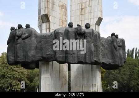 Bishkek, Kyrgyzstan - Sept 11, 2022: Monument Fraternity of People commemorating the entry of Kyrgyzstan into the Russian Empire (erected 1974). Centr Stock Photo