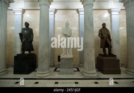 Statue of Alexander Hamilton of New York, center, in the Hall of Columns in the US House (south) side of the United States Capitol in Washington, DC on Friday, September 30, 2022. Among his many achievements, Hamilton is the founder of The New York Post, the oldest continuously published newspaper in the United States. The Hamilton statue was moved from the Rotunda of the United States Capitol to the Hall of Columns to make room for the new statue of US President Harry S Truman. The statue of Patrick Anthony McCarran of Nevada stands left and the statue of Samuel Jordan Kirkwood of Iowa stands Stock Photo