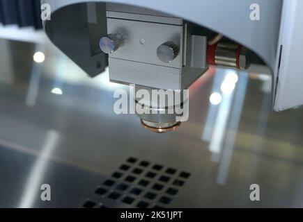 CNC plasma cutting machine working cut metal sheet. Stock Photo