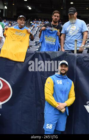 September 12, 2021: Los Angeles Chargers defensive end Joey Bosa (97)  stretches before the NFL regular season game between the Los Angeles  Chargers and the Washington Football Team at FedEx Field in