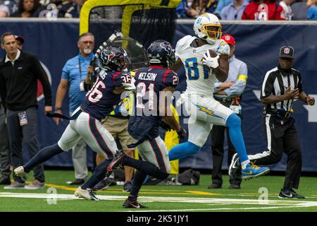 Houston Texans safety Jonathan Owens (36) and Houston Texans cornerback Steven Nelson (21) stop Los Angeles Chargers wide receiver Mike Williams (81) Stock Photo