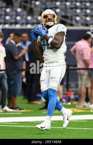 Los Angeles Chargers tight end Tre' McKitty (88) wears a Jamaica flag  sticker on his helmet before an NFL football game against the Houston  Texans, Sunday, Oct. 2, 2022, in Houston. (AP