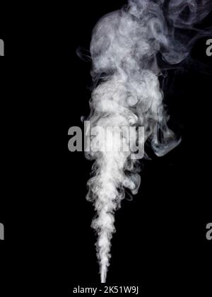 White smoke rising over black background Stock Photo