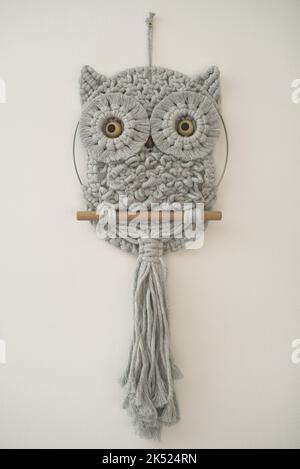 Baby Owl fine art macrame children's room wall decoration cotton cord material with macramé technique Stock Photo