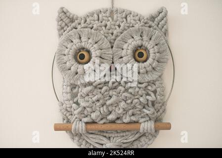 Baby Owl fine art macrame children's room wall decoration cotton cord material with macramé technique Stock Photo