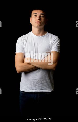 A Portrait of a standing 19 year old teenage boy Stock Photo