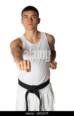 19 Year Old Practacing a Karate Stomach Punch Stock Photo