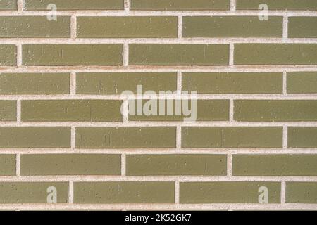 green vintage brick wall with decayed structure. Stock Photo