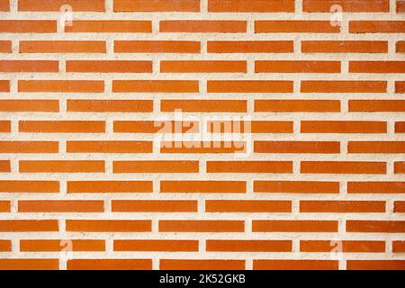 brown vintage brick wall with decayed structure. Stock Photo