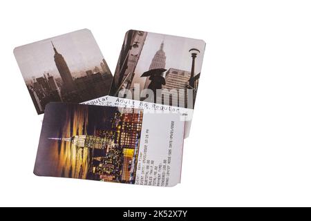 Close up view of colorful Empire State Building tickets on white background isolated. New York. USA. Stock Photo