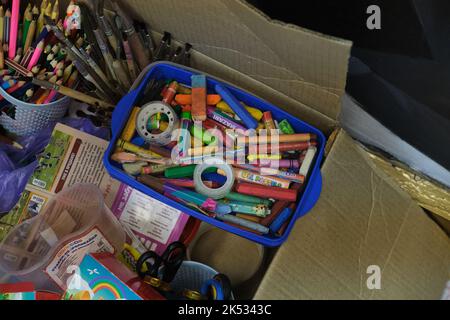 Colored pencils in a pencil case on box background Stock Photo