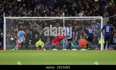 Manchester City's Riyad Mahrez scores their fourth goal from the penalty spotduring the UEFA Champions League Group G match between Manchester City and FC Copenhagen at the Etihad Stadium, Manchester on Wednesday 5th October 2022. (Credit: Mark Fletcher | MI News) Credit: MI News & Sport /Alamy Live News Stock Photo