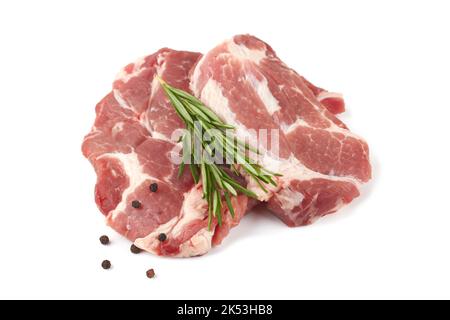 Raw meat with rosemary on a white background Stock Photo