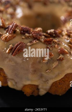 Chocolate pumpkin bundt cake with toffee glaze Stock Photo