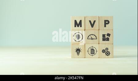 MVP, minimum viable product concept for lean startup. Life cycle of product development. Analysis and market validation. The wooden cubes with abbrevi Stock Photo