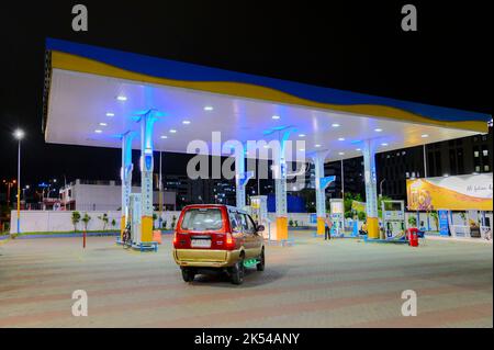 Kolkata, West Bengal, India - 24th October 2020 : Beautiful night image of a petrol pump at night. Petrol is becoming expensive day by day at Kolkata. Stock Photo