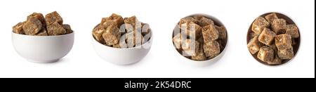 set of jaggery pieces in a bowl, golden brown colored cube shaped unrefined sugar product also called kithul jaggery or palm sugar, traditional food Stock Photo