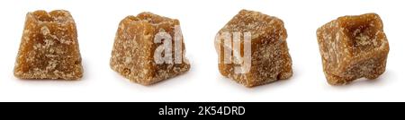 close-up macro view of jaggery pieces, golden brown colored cube shaped unrefined sugar product also called kithul jaggery or palm sugar Stock Photo