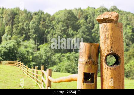 Wooden fence made from bamboo. And beautiful nature. clear sky Stock Photo