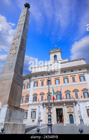 Facade of Montecitorio Palace (Palazzo Montecitorio) in Rome: it's the seat of the Chamber of Deputies, one of Italy’s two houses of parliament. Stock Photo