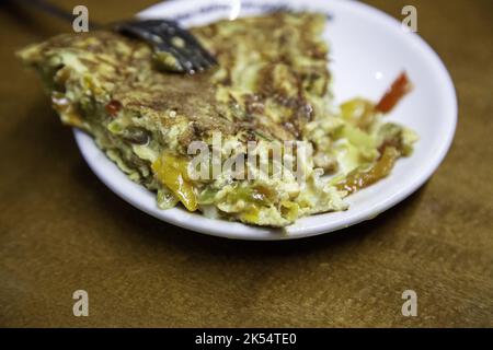 Detail of typical Spanish lunch, food with potatoes and eggs Stock Photo