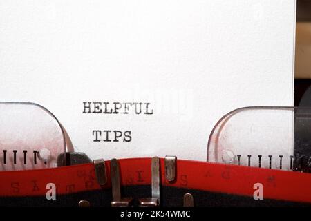 Helpful tips text written with a typewriter. Stock Photo