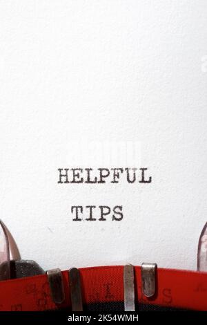 Helpful tips text written with a typewriter. Stock Photo