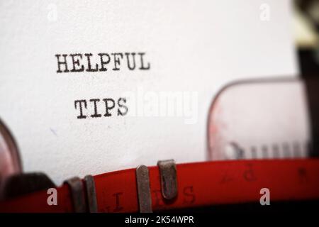 Helpful tips text written with a typewriter. Stock Photo