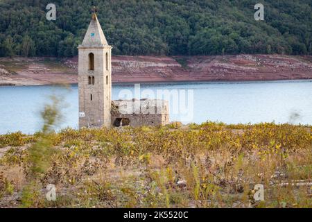 Former village and Church of Sant Romà de Sau, underwater nowadays most of the year due to the reservoir construction in the early 1960's Stock Photo