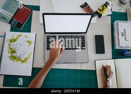 Hand, laptop and creative writing above for design or art at work on office desk. Hands of designer, freelancer or artist working with computer and Stock Photo