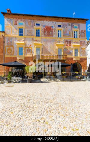Governor's Palace in  Mondovi Piazza Maggiore, medieval building with frescoed brick facade. Province of Cuneo, Piedmont, northern Italy. The beautifu Stock Photo