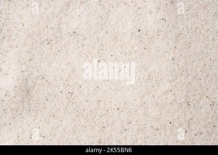 Natural background of white sand. Stock Photo
