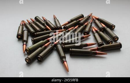 Live ammunition for assault rifle with red mark on a bullets studio isolated angle view Stock Photo