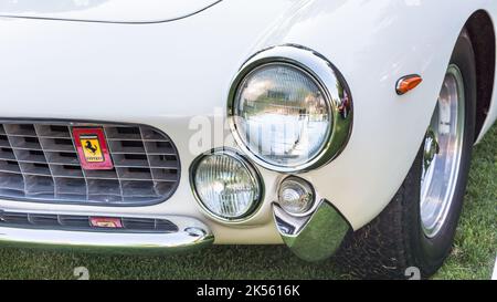 PLYMOUTH, MI/USA - JULY 30, 2017: Close up of 1964 Ferrari Lusso Berlinetta by Pininfarina headlights at Concours d'Elegance of America car show. Stock Photo