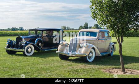 HICKORY CORNERS, MI/USA - AUGUST 27, 2017: A 1931 and 1936 Pierce-Arrow cars, Pierce-Arrow Society Gathering, Gilmore Car Museum. Stock Photo