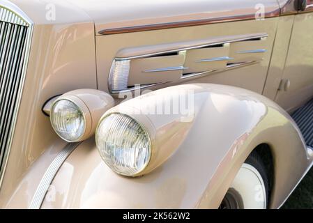 HICKORY CORNERS, MI/USA - AUGUST 27, 2017: Close-up of a 1936 Pierce-Arrow  headlight, Pierce-Arrow Society Gathering, Gilmore Car Museum. Stock Photo