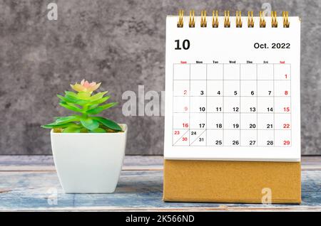 October 2022 Monthly desk calendar for 2022 year with plant pot. Stock Photo