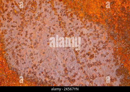 A closeup of an old rusty piece of metal - perfect for background Stock Photo