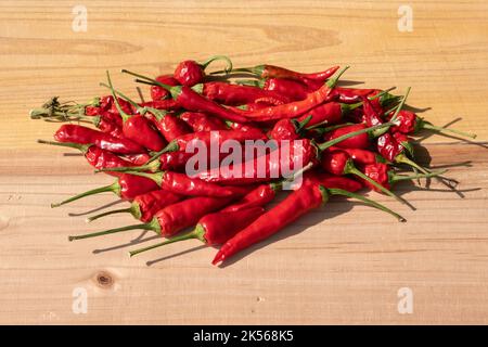 red pepper on table, very popular ingredient that makes the kitchen delights very tasty. The spicy is very popular in popular dishes. Stock Photo