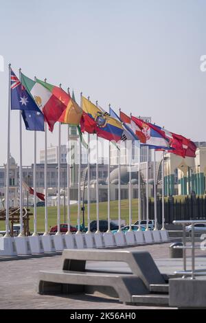 Flags of nations qualified for World Cup 2022 Qatar at Doha Corniche, Qatar. Stock Photo