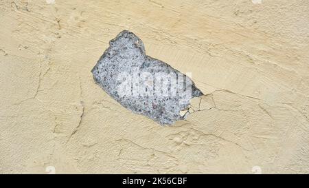 Cracked yellow wall. Stock Photo