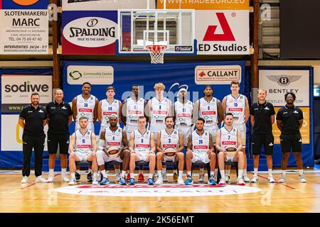 (top L-R), Mechelen's Assistant coach Wim Van Poucke, Mechelen's sports director Tony Van den Bosch, Mechelen's Richmond Aririguzoh, Mechelen's Jonas Foerts, Mechelen's Tshimanga Godwin, Mechelen's Joppe Mennes, Mechelen's Brian Fobbs, Mechelen's Deandre Davis, Mechelen's Mattias Palinckx, Mechelen's head coach Kristof Michiels, Mechelen's strenght coach Ilyach Ouattara, (under L-R), Mechelen's Fatlind Shoshaj, Mechelen's Wen Mukubu, Mechelen's Jo Van Buggenhout, Mechelen's Domien Loubry, Mechelen's Larry Thomas and Mechelen's Luka Kotrulja poses at a photoshoot of Belgian Basketball team Kang Stock Photo