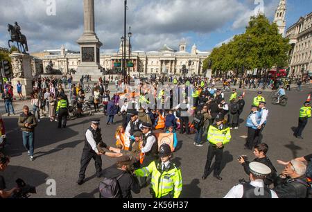 London, England, UK. 6th Oct, 2022. Climate campaign group Just Stop Oil protesters block road at Trafalgar Square. (Credit Image: © Tayfun Salci/ZUMA Press Wire) Stock Photo